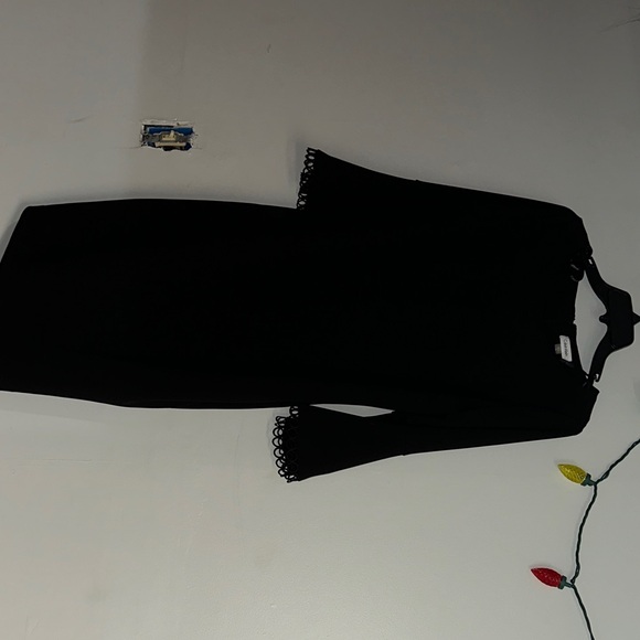Calvin Klein Elegant Black Garment - Picture 1 of 3